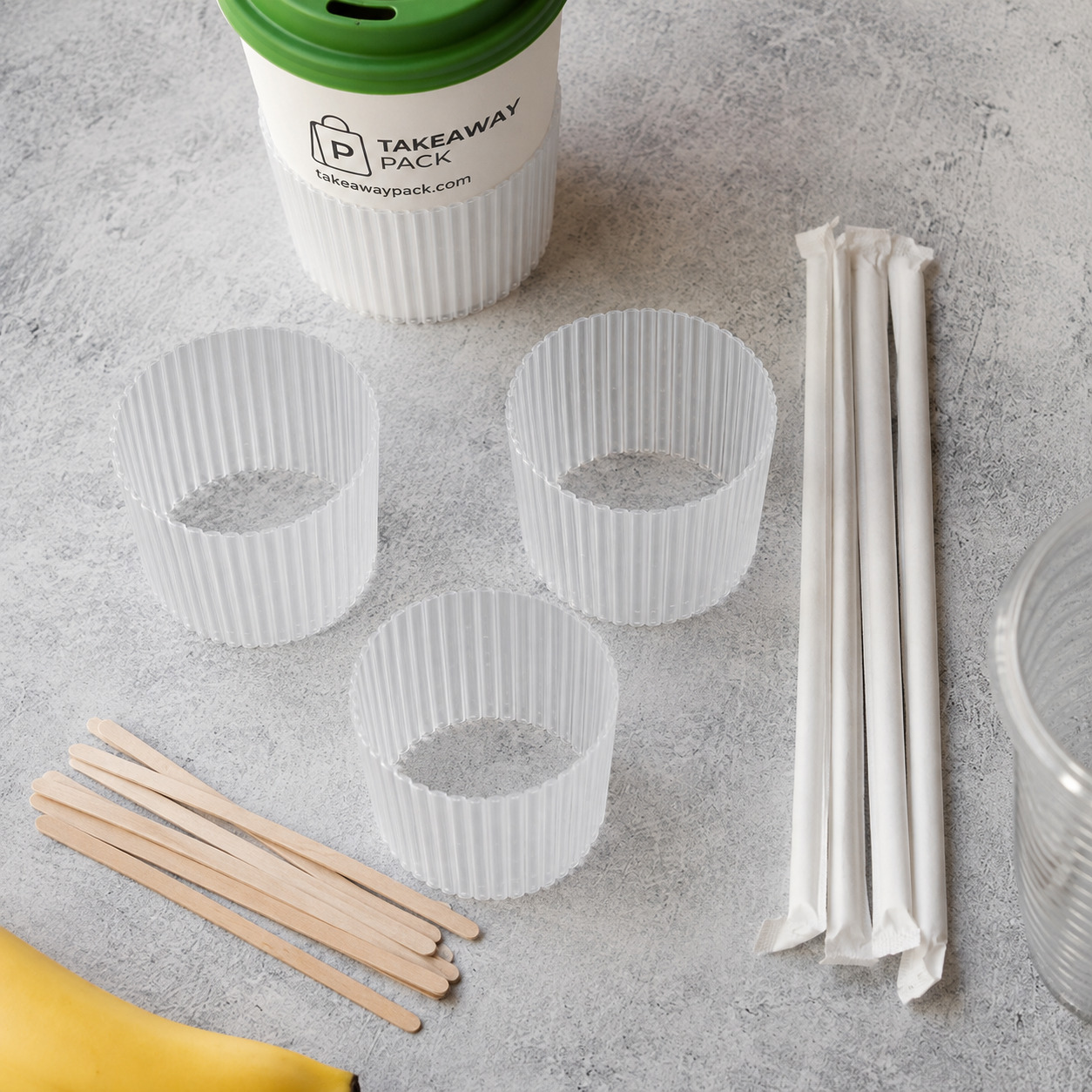 Custom printed kraft takeaway bag, boxes, and cups showing branded packaging options