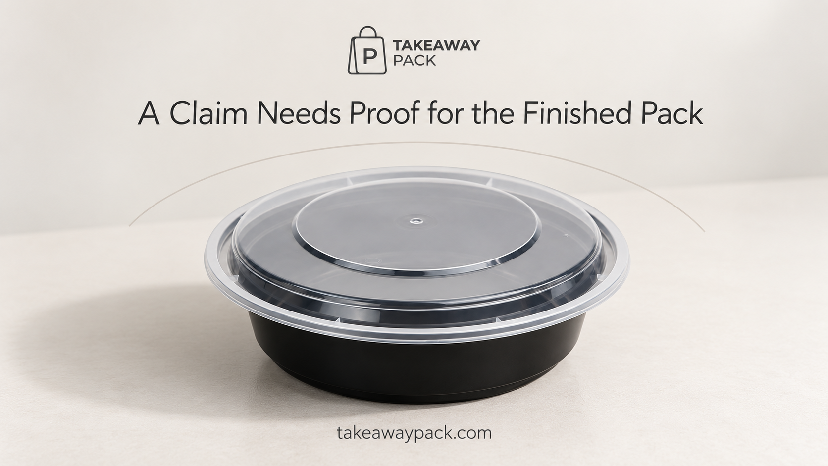 Black takeaway container with a clear lid.