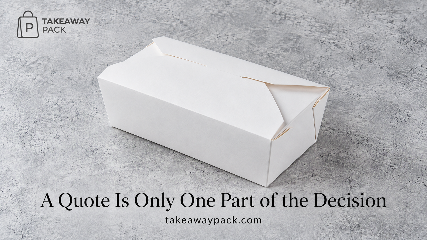 White takeaway box on a grey stone surface.
