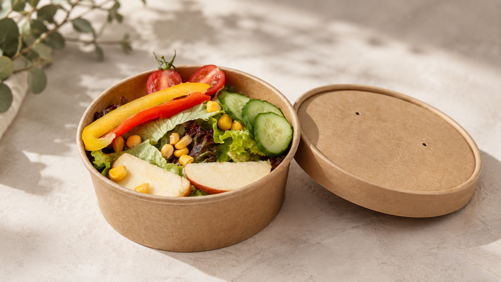 Compostable food packaging containers arranged for a composting demonstration