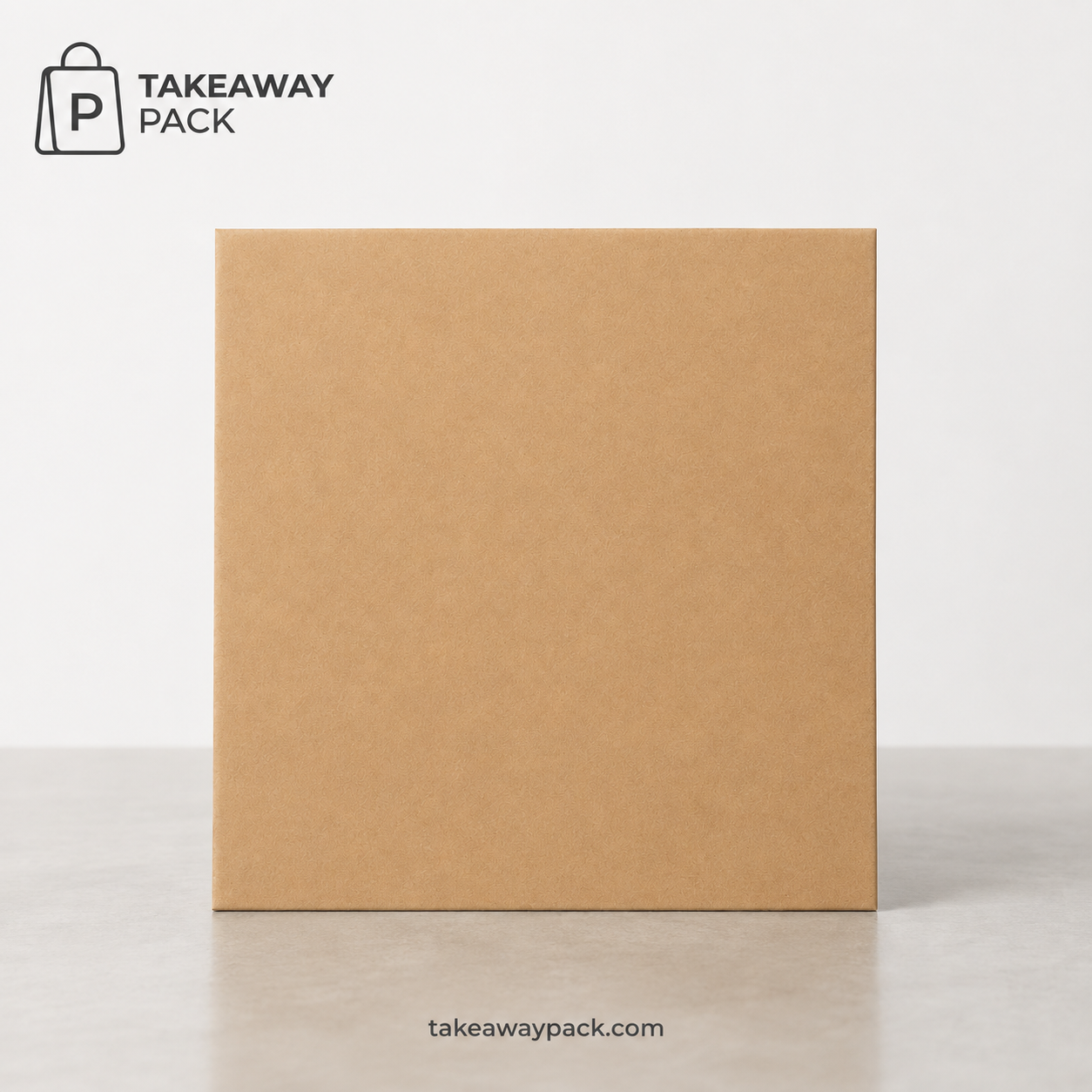 Upright plain kraft paperboard carton on a light counter