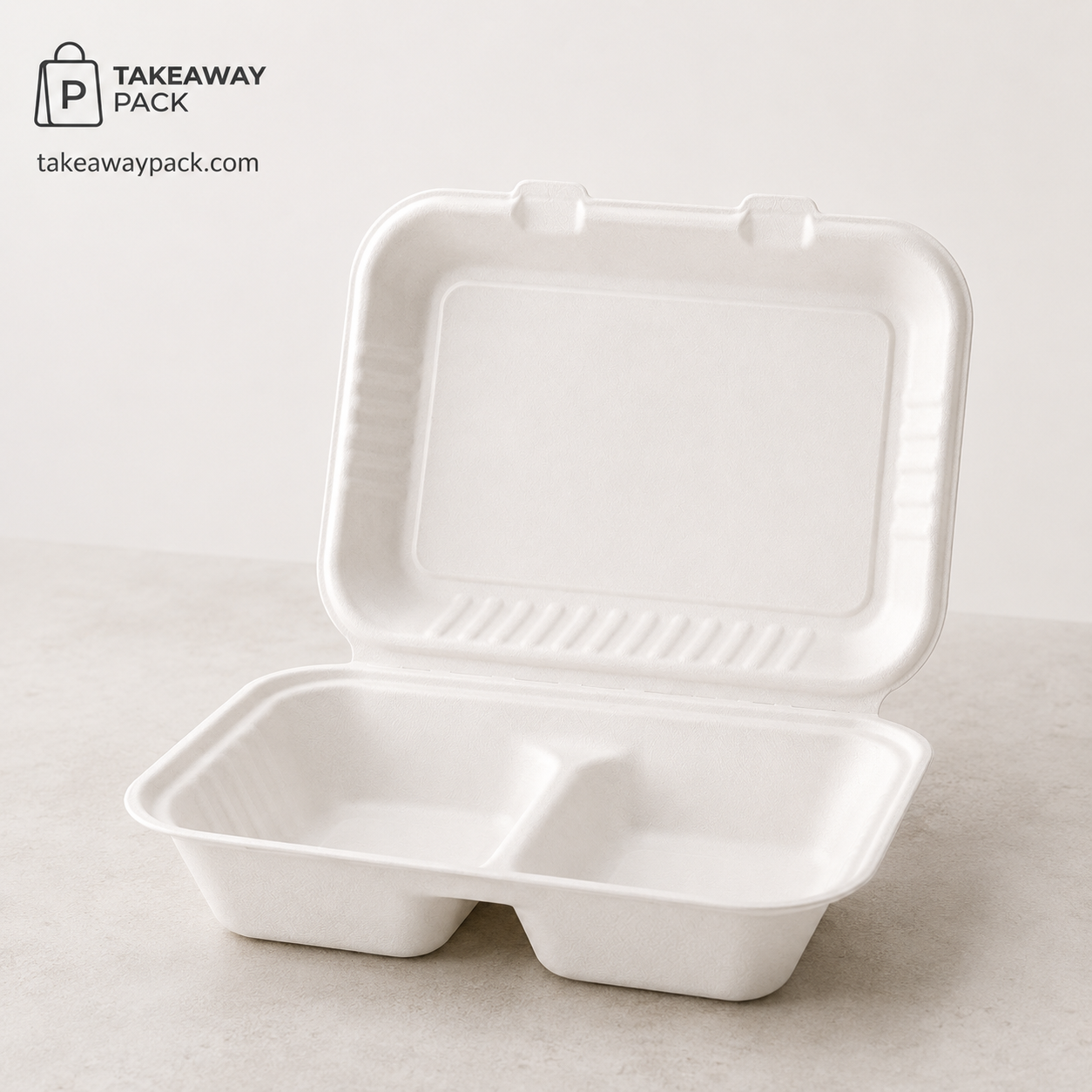 Open white two-compartment molded-fiber clamshell takeaway box