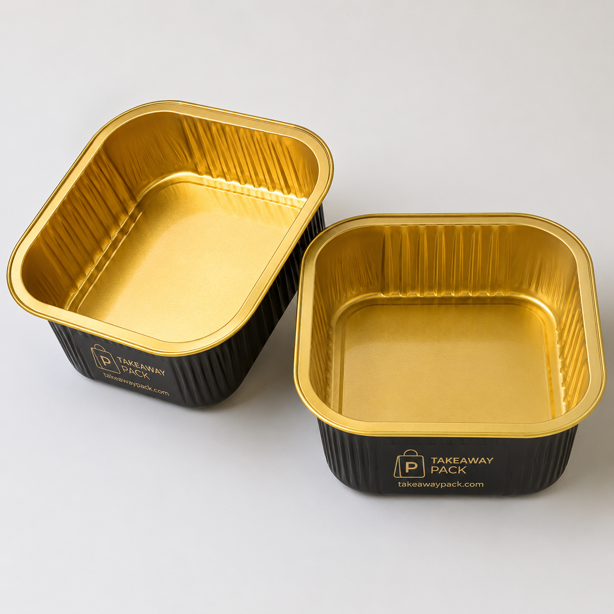 Clear PET iced coffee cups with dome lids in a molded fibre four-cup carrier beside a PE drink bag