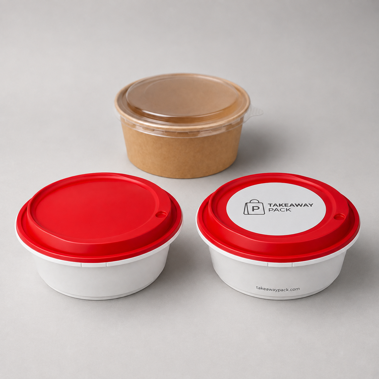 Two white round containers with red seal lids, one plain and one printed with a brand name and web address, stand beside a round brown kraft box fitted with a clear lid.