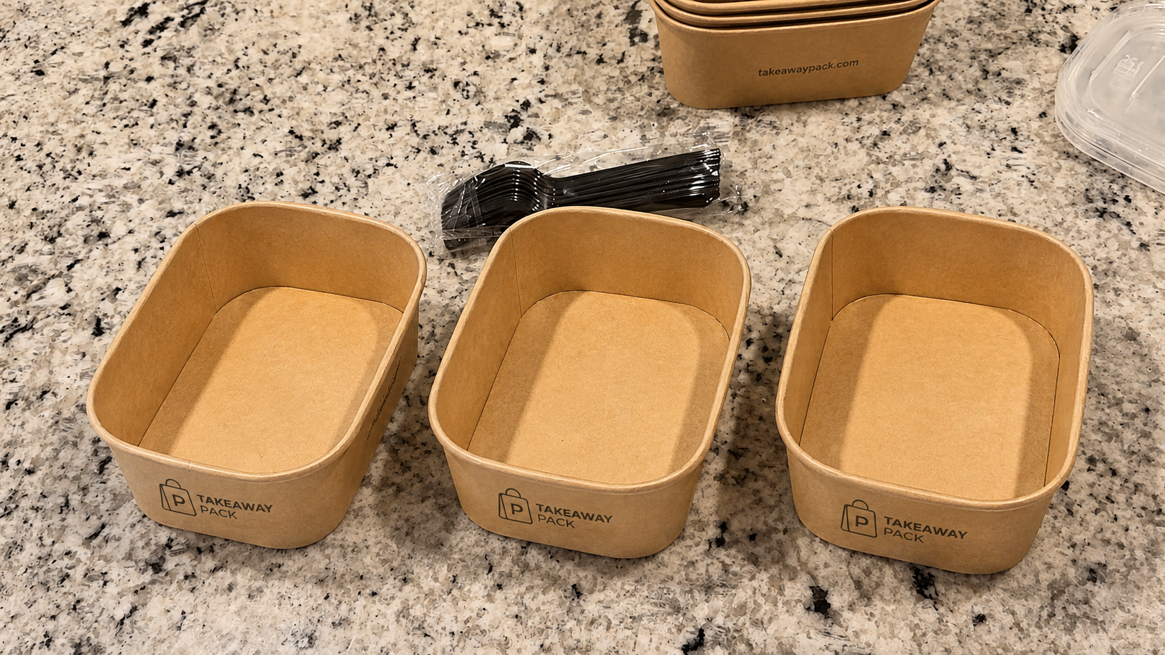 Stacks of matching takeaway containers in several sizes sharing one rim diameter