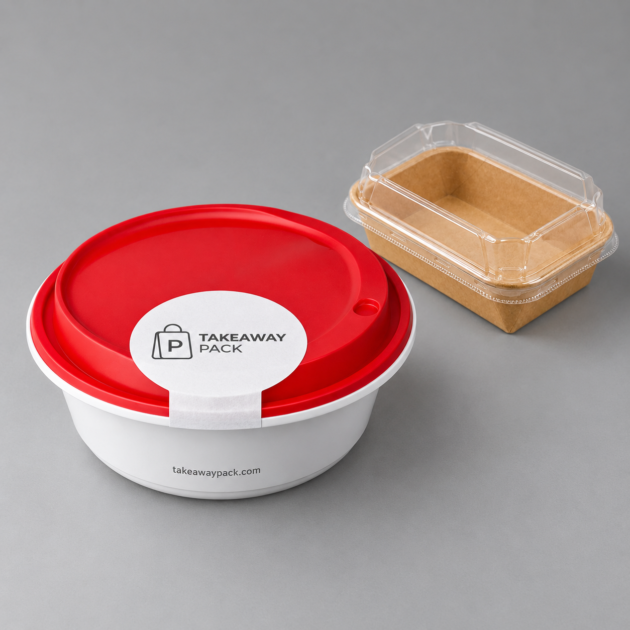 A round container with a red seal lid carrying a printed brand label and web address sits beside a small square container with a clear lid and a light brown interior.