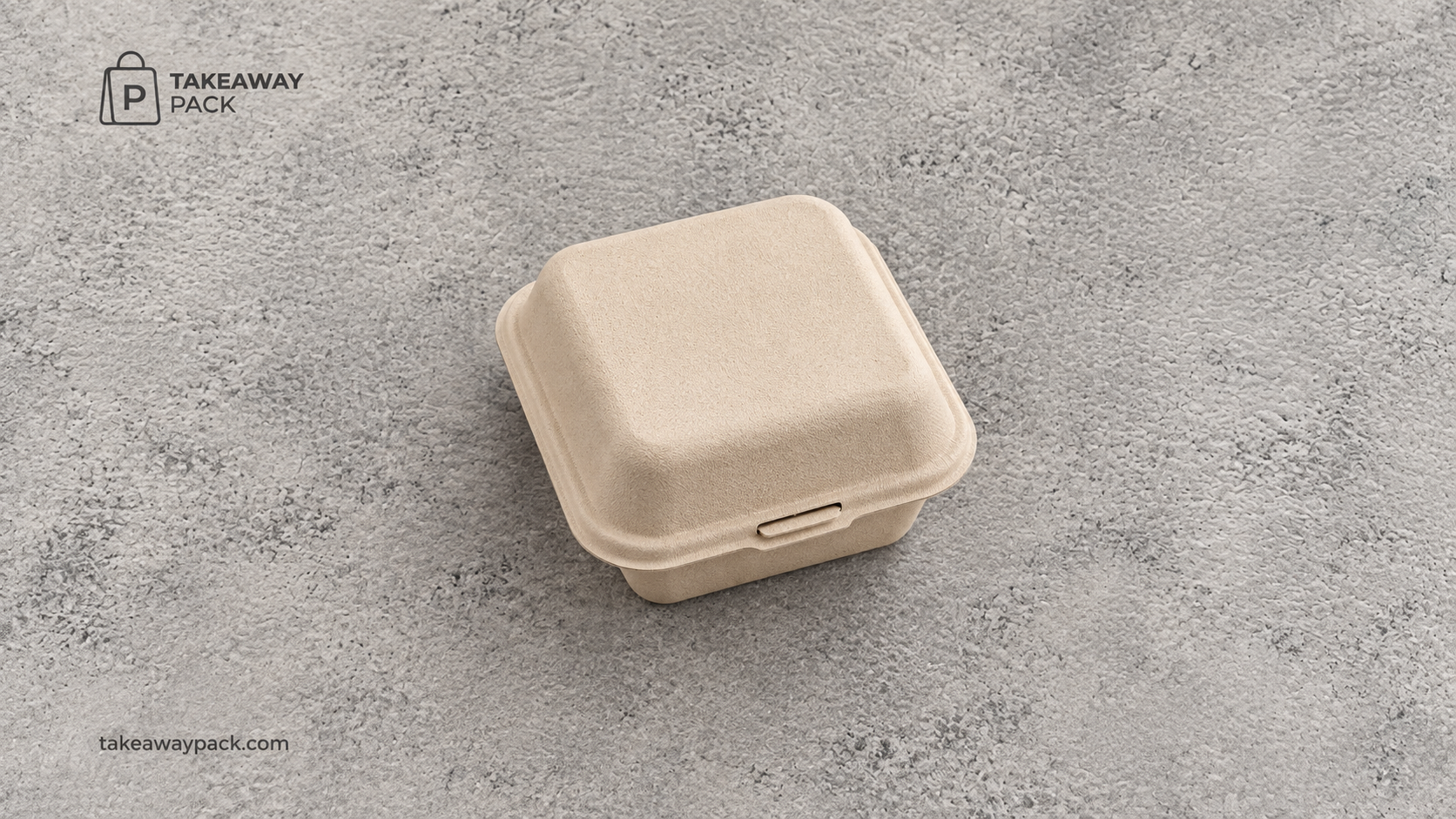 Closed beige molded-fiber clamshell container on a grey textured surface.